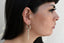 Encantos de aretes de armas