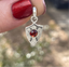 Palestine Sunbird Escutcheon with Rosecut Garnet